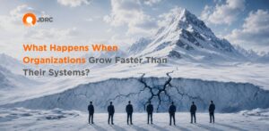 What Happens When Organizations Grow Faster Than Their Systems?